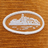 corteiz_short_peak_trucker_hat_sunburn_orange_2