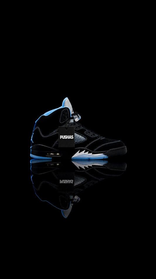 Air Jordan 5 Retro 'Black University Blue' (2026) on a dark reflective surface